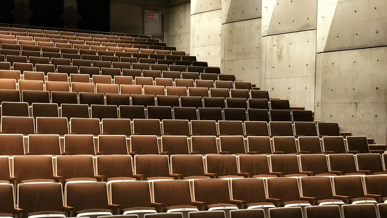 photography of theater chairs