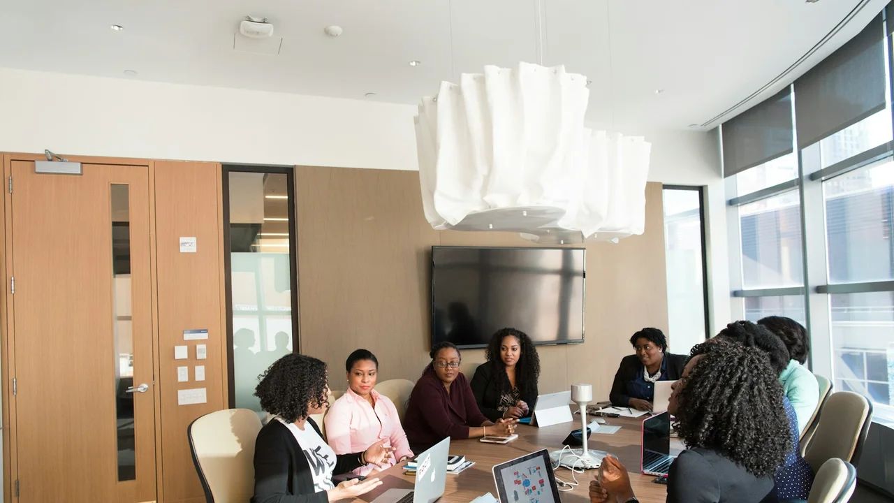 photography of people inside room during daytime